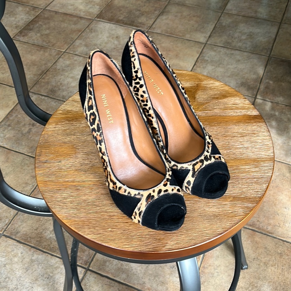 Nine West black suede and leopard print peep toe heels.  Size 9.